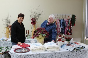 Doreen Sappier and Ruth Somerville admire some of the crafts at the new Arts & Crafts Center on Perth Main Street