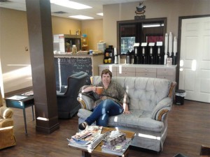 Sarah Nicholson relaxes with a freshly brewed coffee at her newly opened coffee shop Bisque & Biscotti 