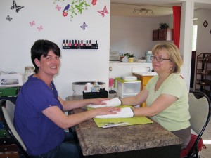 Barb Rideout gets a soothing Hot Paraffin Wax Treatment for her hands from Margaret Pearson at Shimmer & Shine 