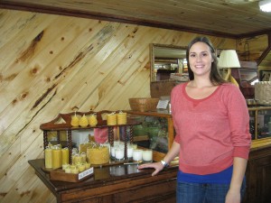 Ashley Nissen Dallaire with a selection of her hand made natural beeswax and soy candles at Nissen’s Market