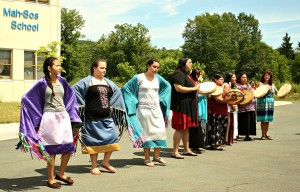 Negoot Kowi Ehpicik Women's Drum Group with the "Dance of The Spirit" shawl dancers Photo courtesy of Joe Gee