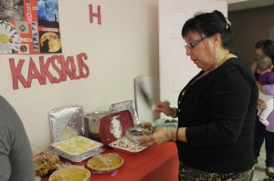 Sharlene Paul blesses the wonderful potluck buffet with a traditional sage smudge.