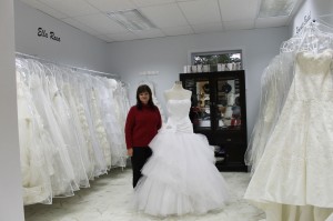 Cindy McLaughlin among some of the 150 wedding dresses on display