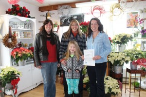 Sydney Heffernan receives her $500 Gift Certificate  from PABC  members Stacey Kelley, Rochelle Pelletier and Beverly Hoyt at Hoyt’s Flowers and Gifts in Perth-Andover