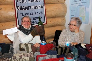 Lore-Ann Carroll and Darlene Frenette make hand knitted socks, hats, mittens and beer mitts