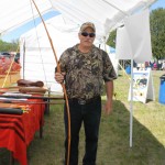 Bowyer Dave Green of Tobique Narrows with a hand-made yew bow